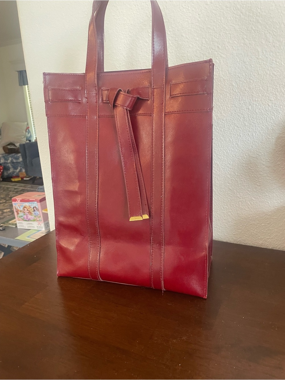 Estee Lauder Red Leather Tote with Tie-Front Detail